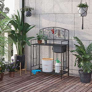 Outsunny Folding Potting Bench Table, Metal Garden Workstation, Work Bench with Large Built-in Bag with Cover, 5 Hanging Hooks & Storage Shelf, Leaf Pattern